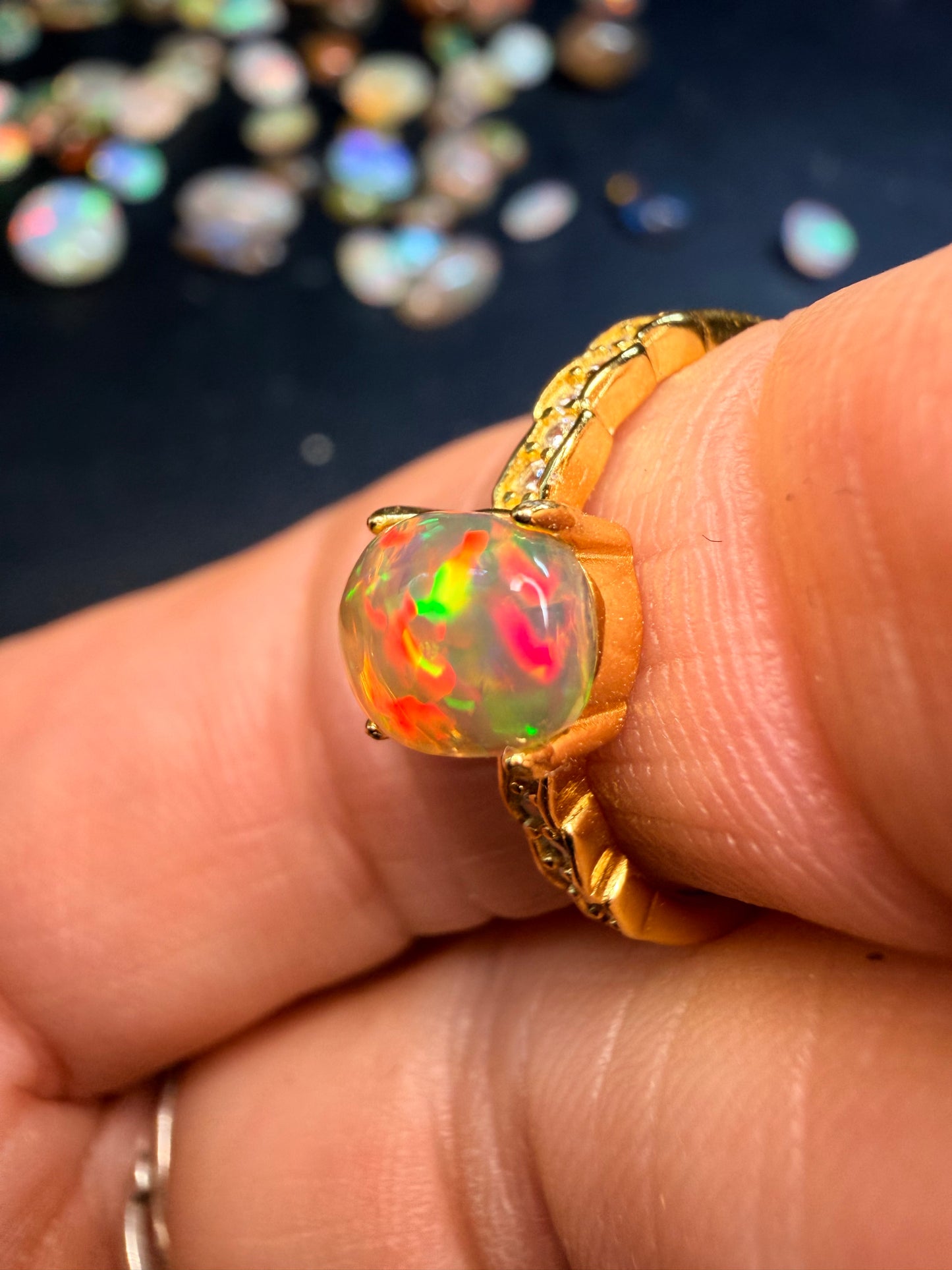 7.7mm x 6.1mm Ethiopian opal adjustable Ring in 925 gold setting