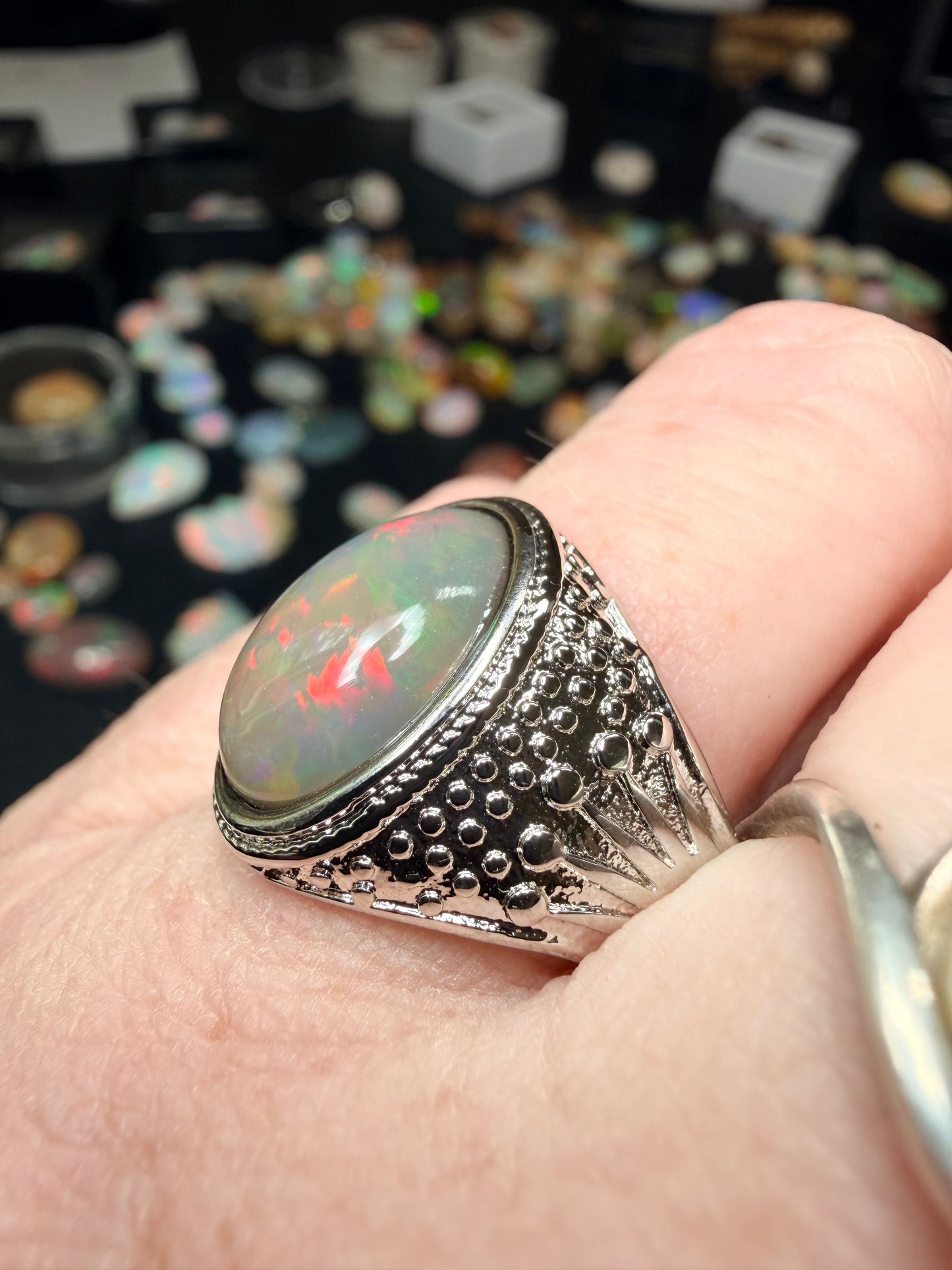 Men’s all natural 3.7 carat Ethiopian opal adjustable ring in dark base