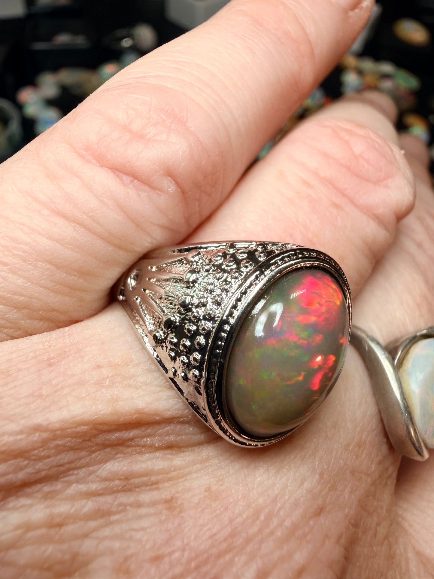Men’s all natural 3.7 carat Ethiopian opal adjustable ring in dark base