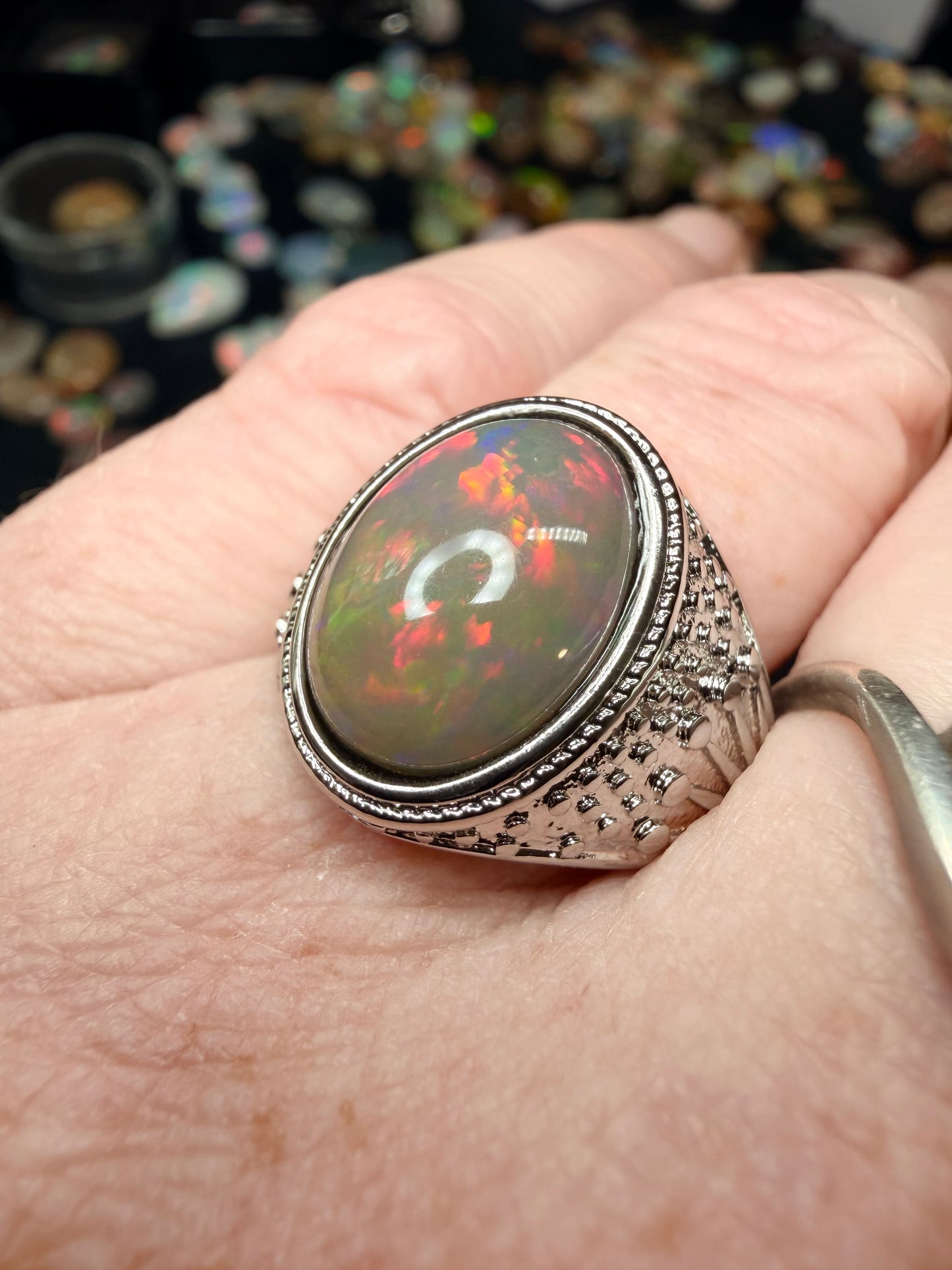 Men’s all natural 3.7 carat Ethiopian opal adjustable ring in dark base