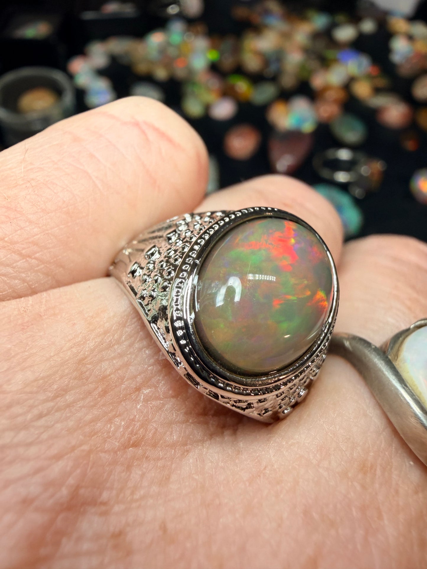 Men’s all natural 3.7 carat Ethiopian opal adjustable ring in dark base