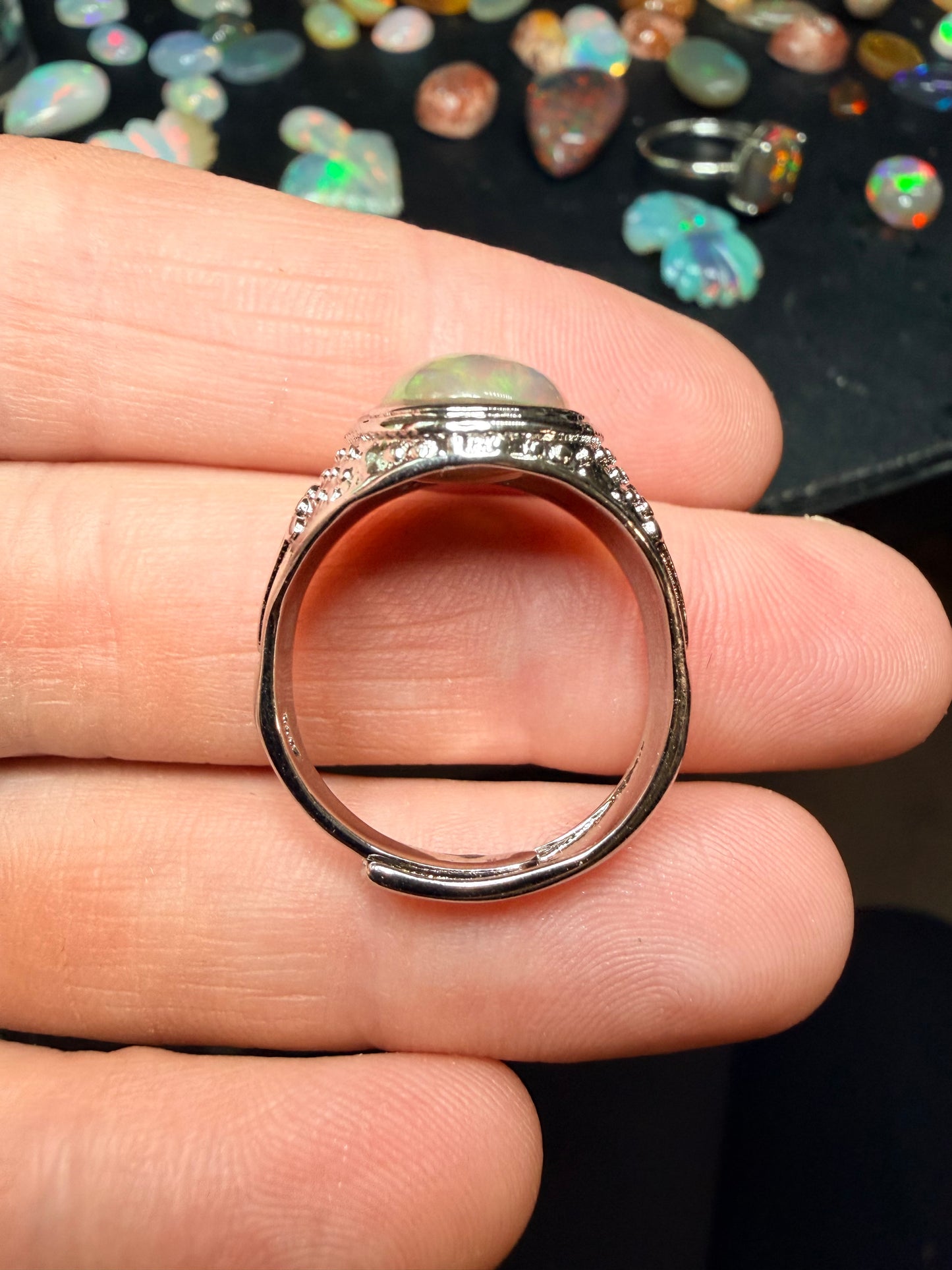 Men’s all natural 3.7 carat Ethiopian opal adjustable ring in dark base