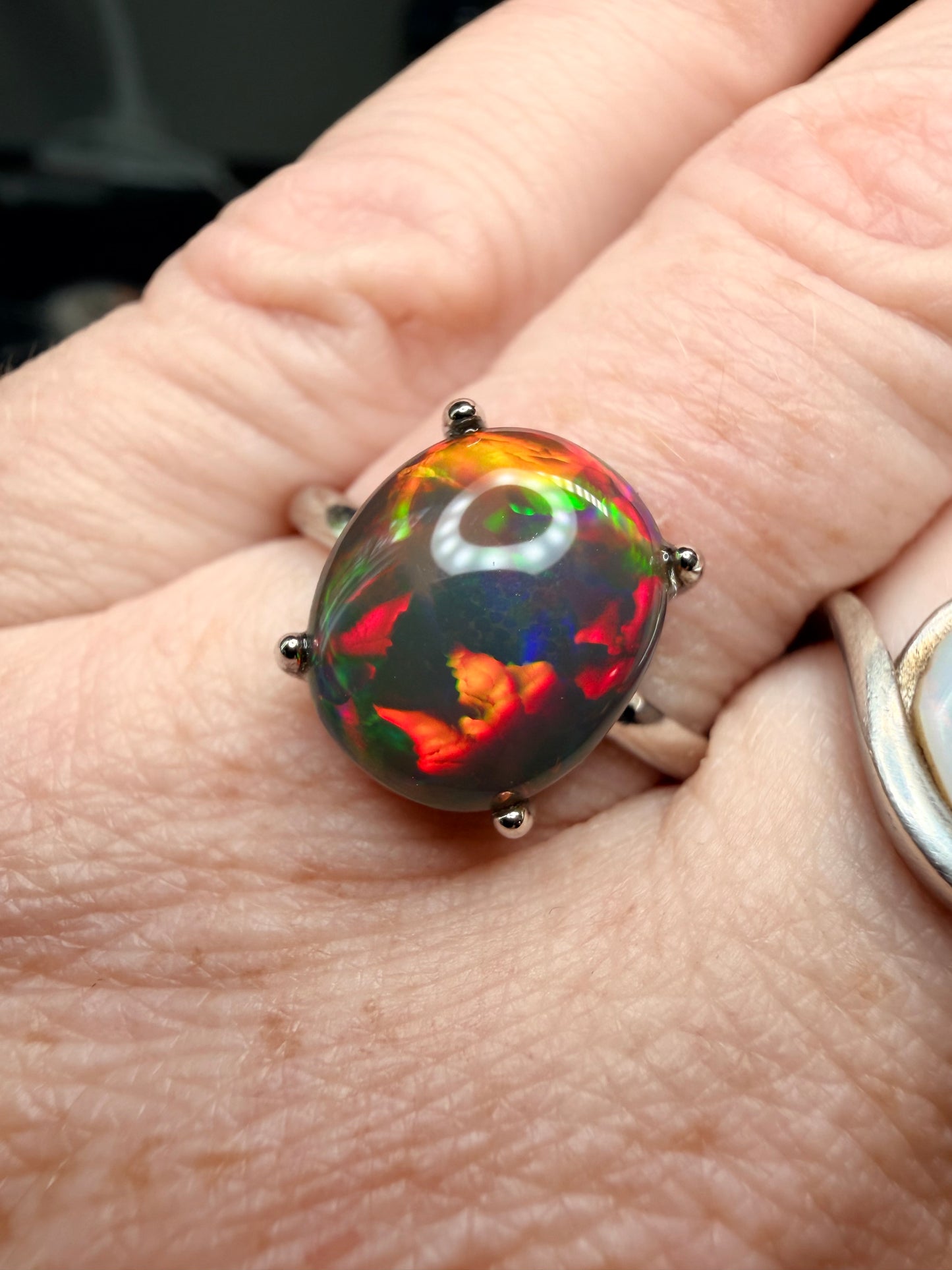 3.4 carat all natural black Ethiopian opal adjustable ring