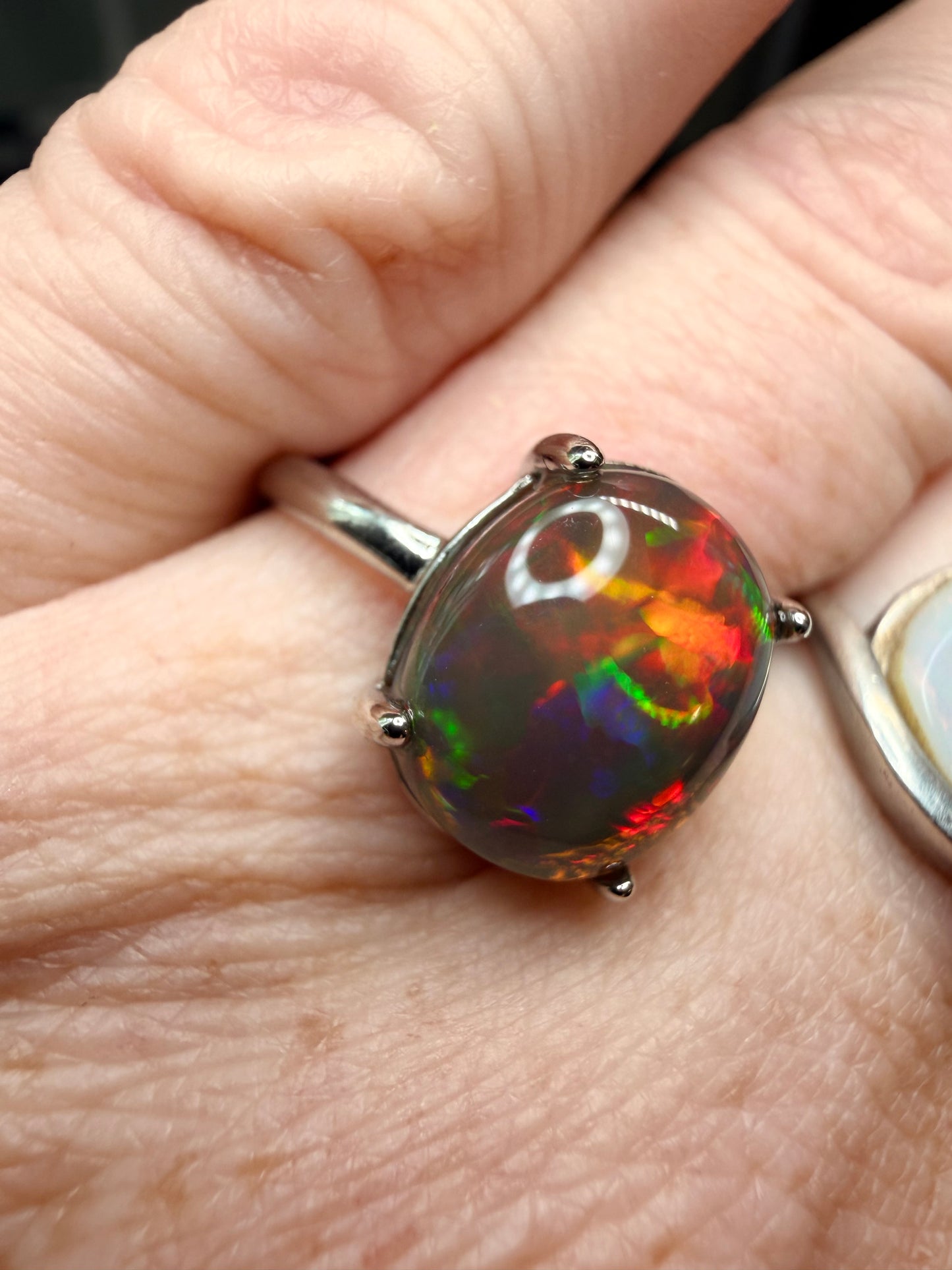 3.4 carat all natural black Ethiopian opal adjustable ring