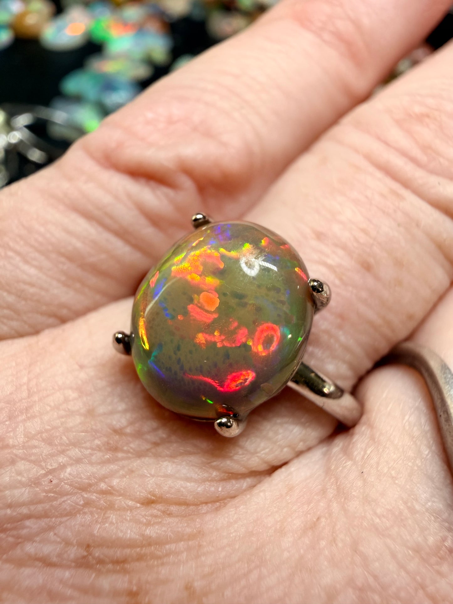4.1 carat all natural dark honeycomb Ethiopian opal adjustable ring