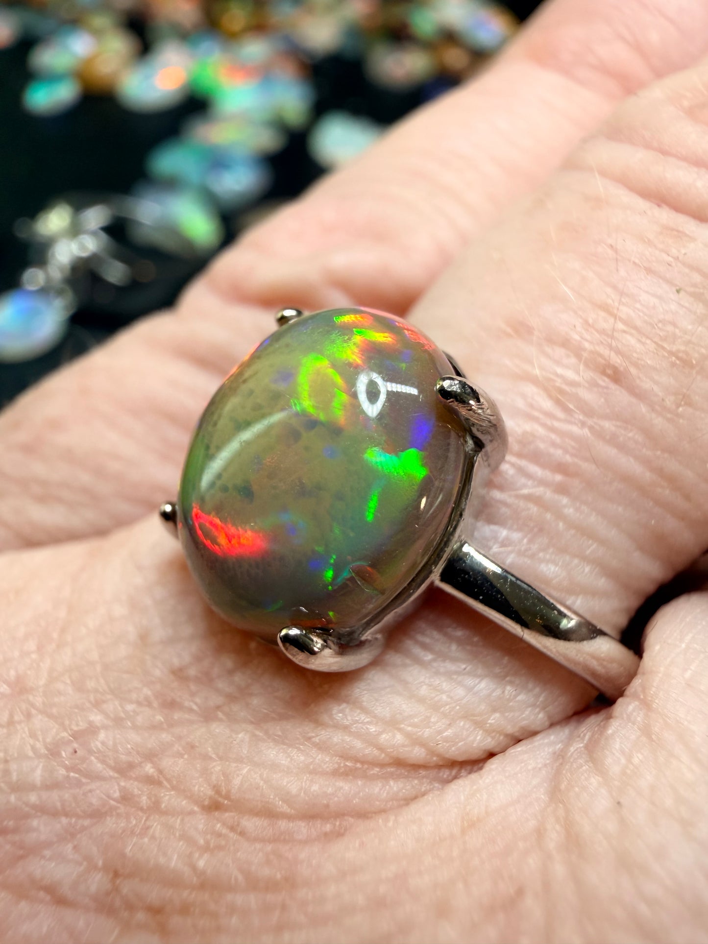 4.1 carat all natural dark honeycomb Ethiopian opal adjustable ring
