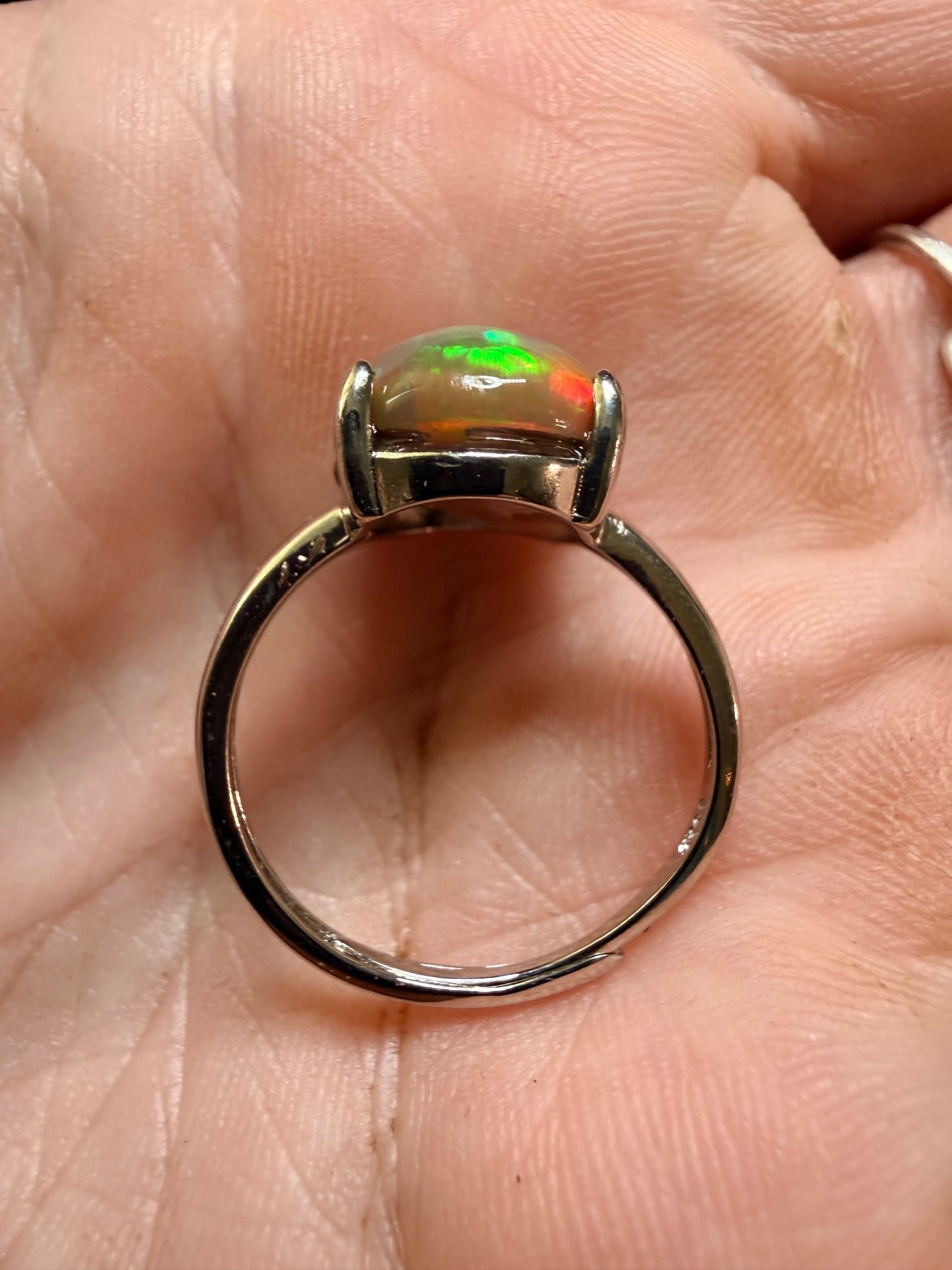 4.1 carat all natural dark honeycomb Ethiopian opal adjustable ring