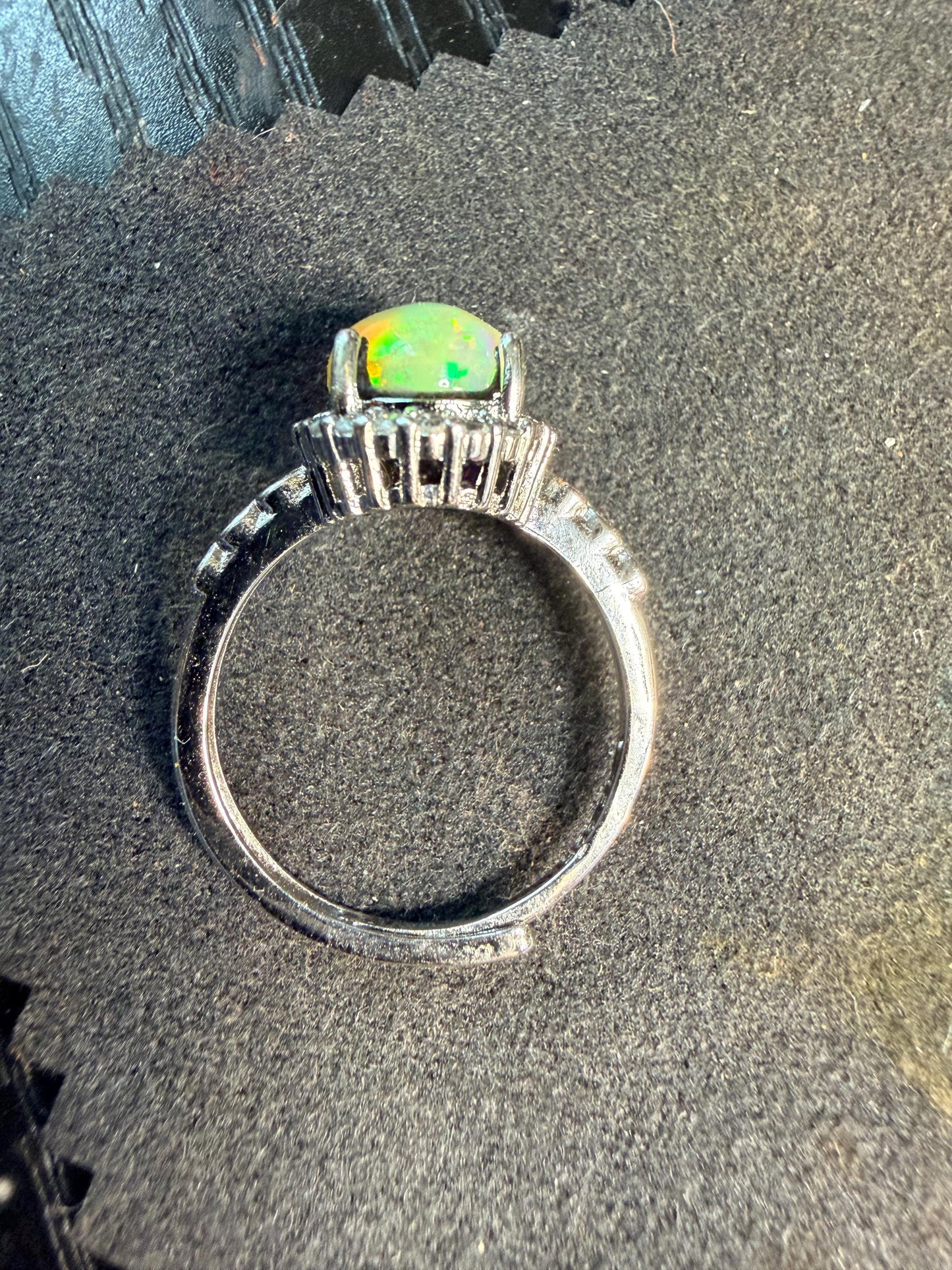 2.2 carat Ethiopian opal adjustable ring green base green orange flash