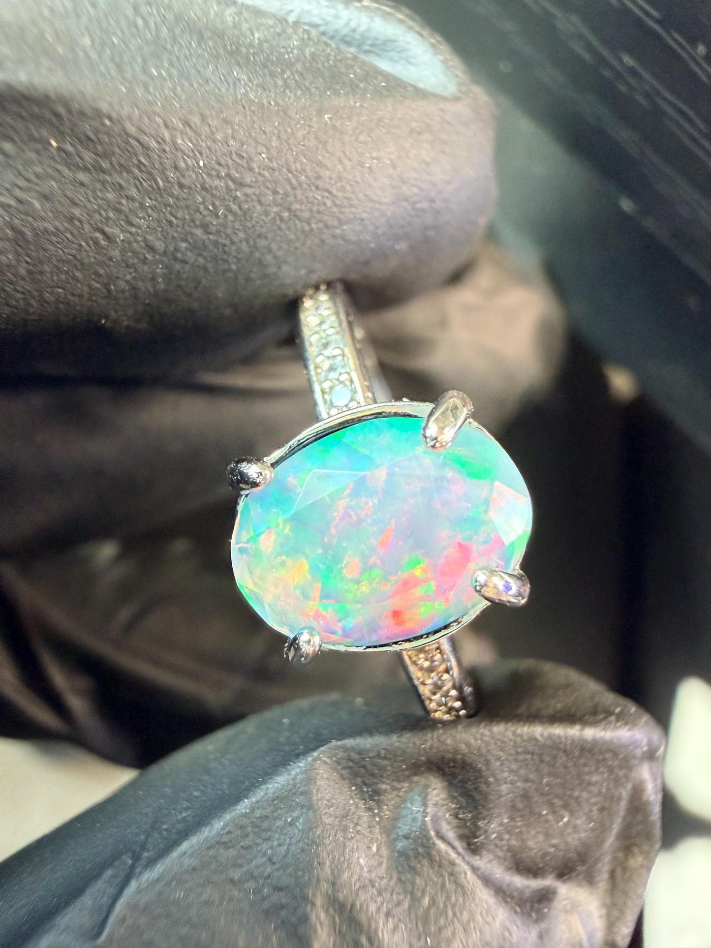 Faceted 1.2 carat Ethiopian opal adjustable ring