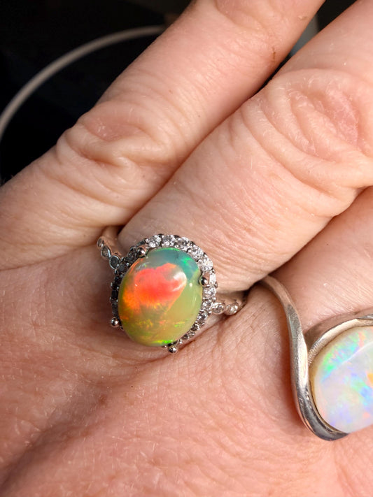 2.2 carat Ethiopian opal adjustable ring green base green orange flash