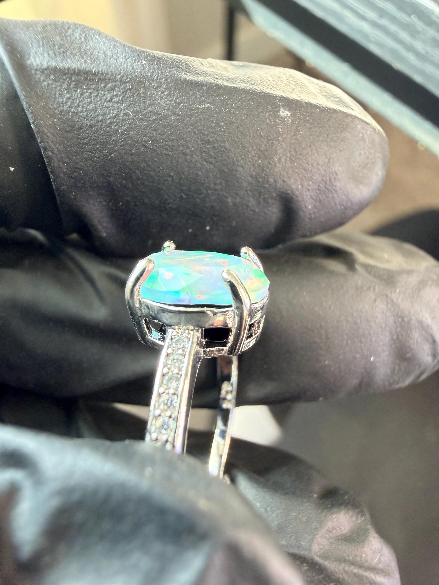 Faceted 1.2 carat Ethiopian opal adjustable ring