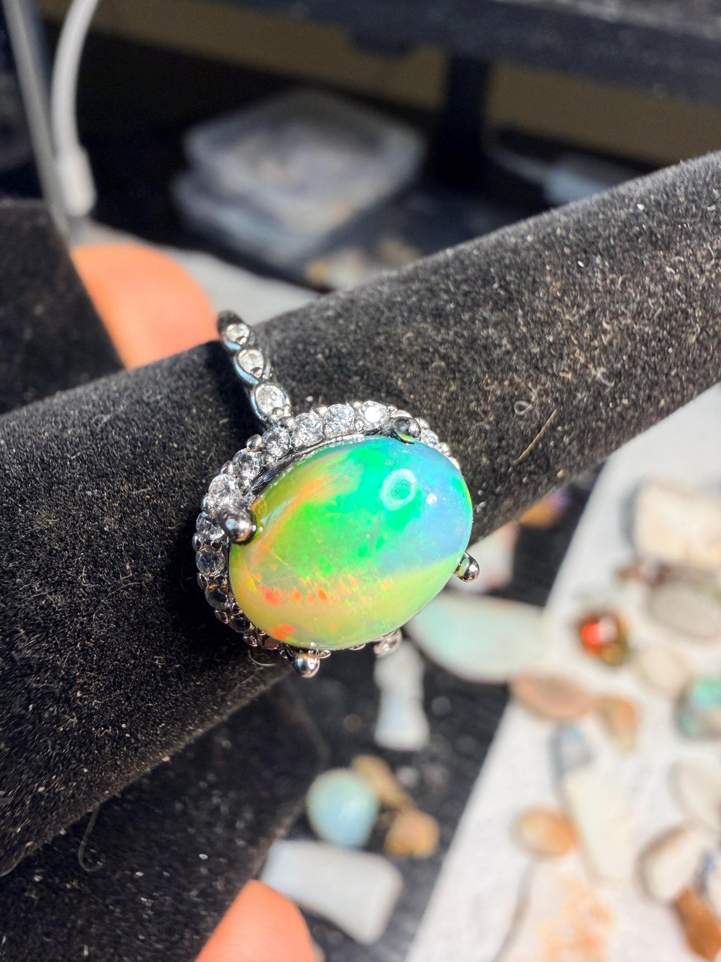 2.2 carat Ethiopian opal adjustable ring green base green orange flash