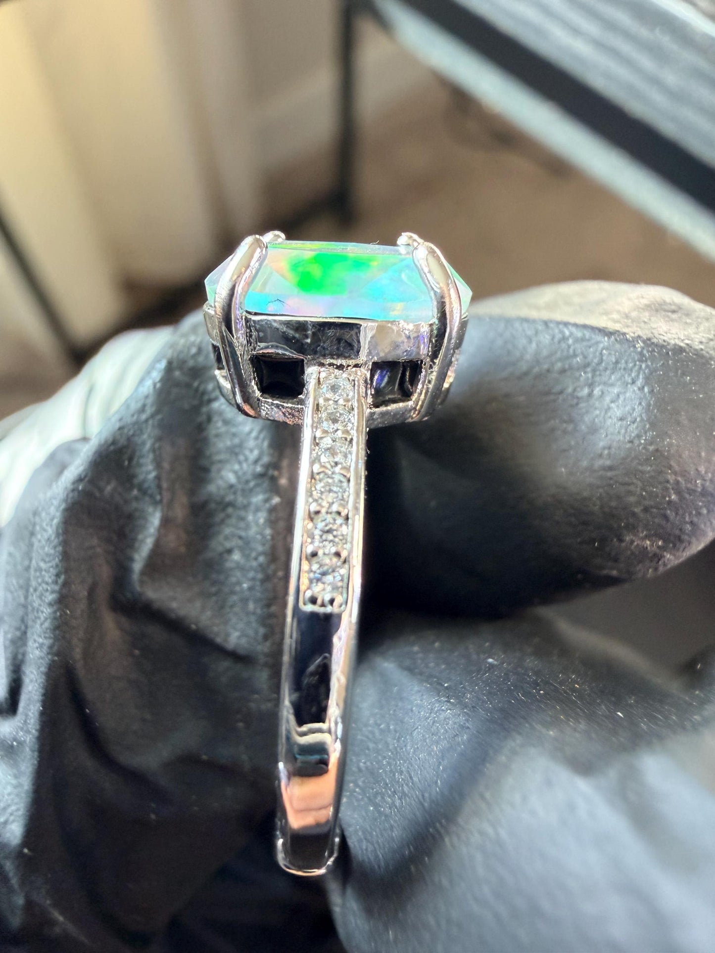 Faceted 1.2 carat Ethiopian opal adjustable ring