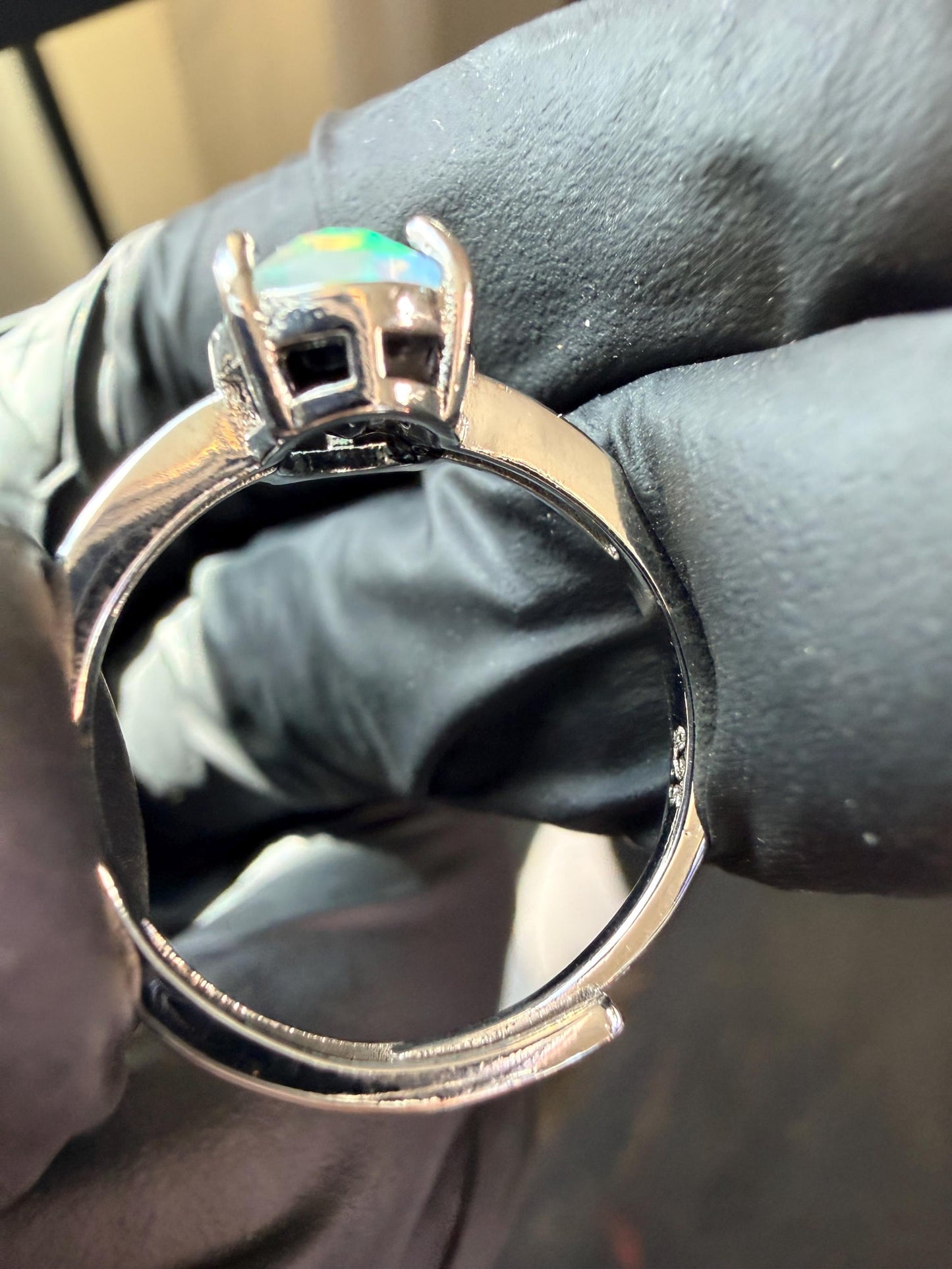 Faceted 1.2 carat Ethiopian opal adjustable ring