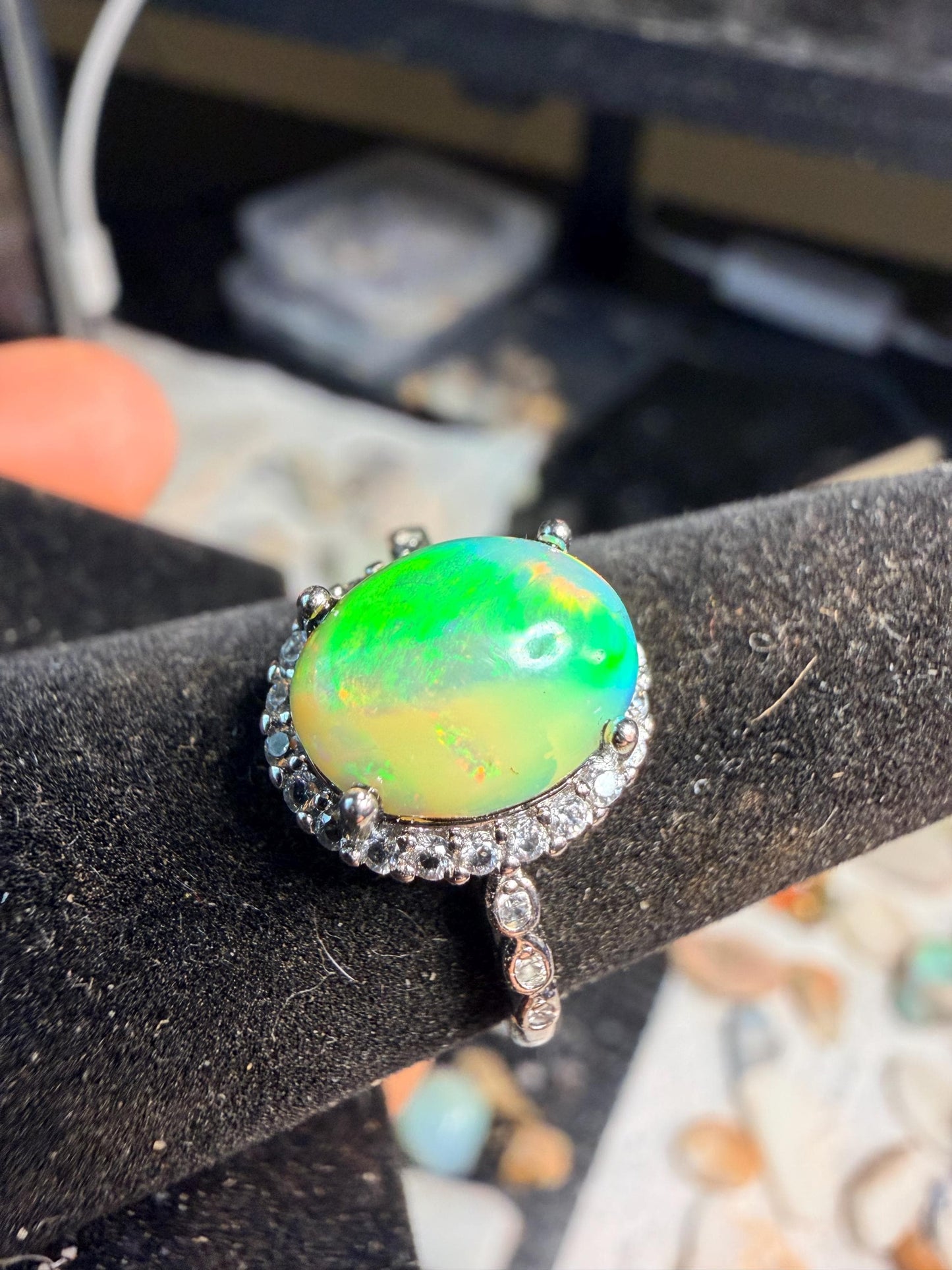 2.2 carat Ethiopian opal adjustable ring green base green orange flash